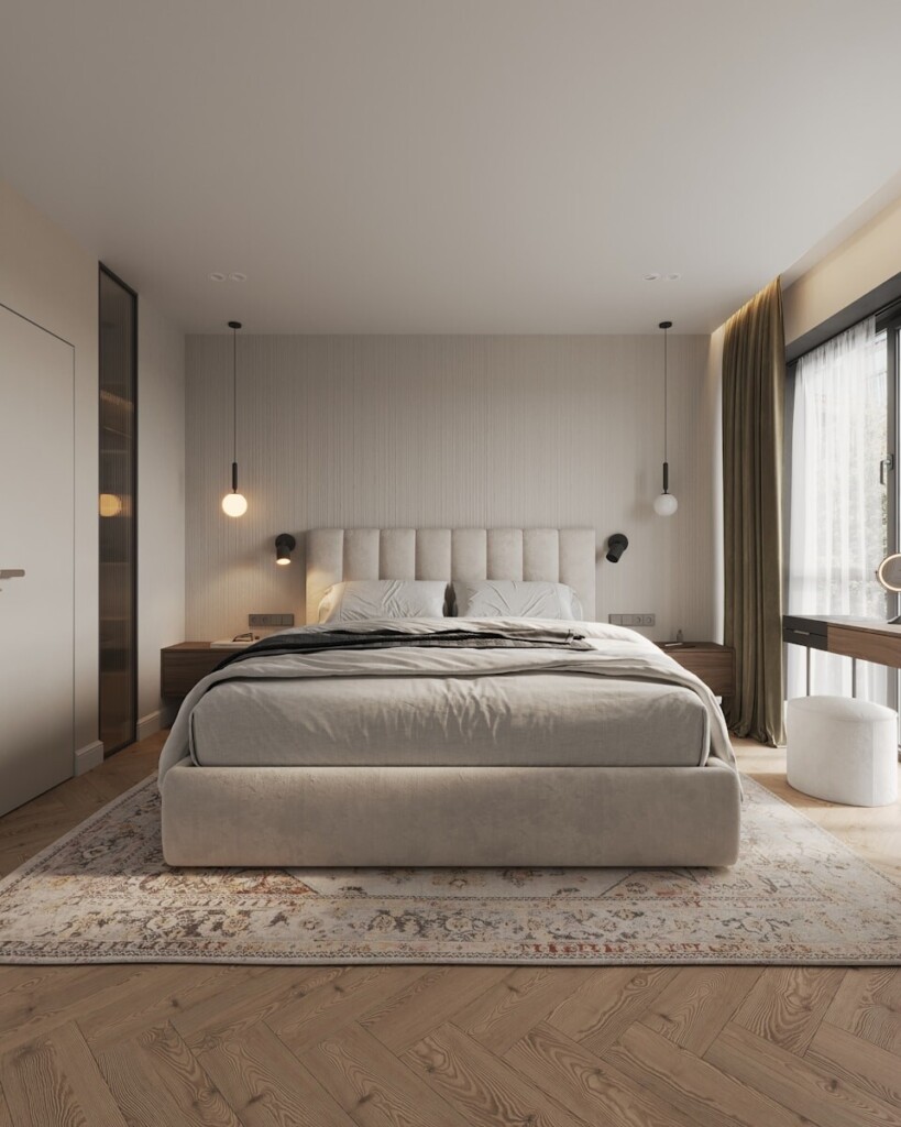 A bedroom with a large bed and a large window